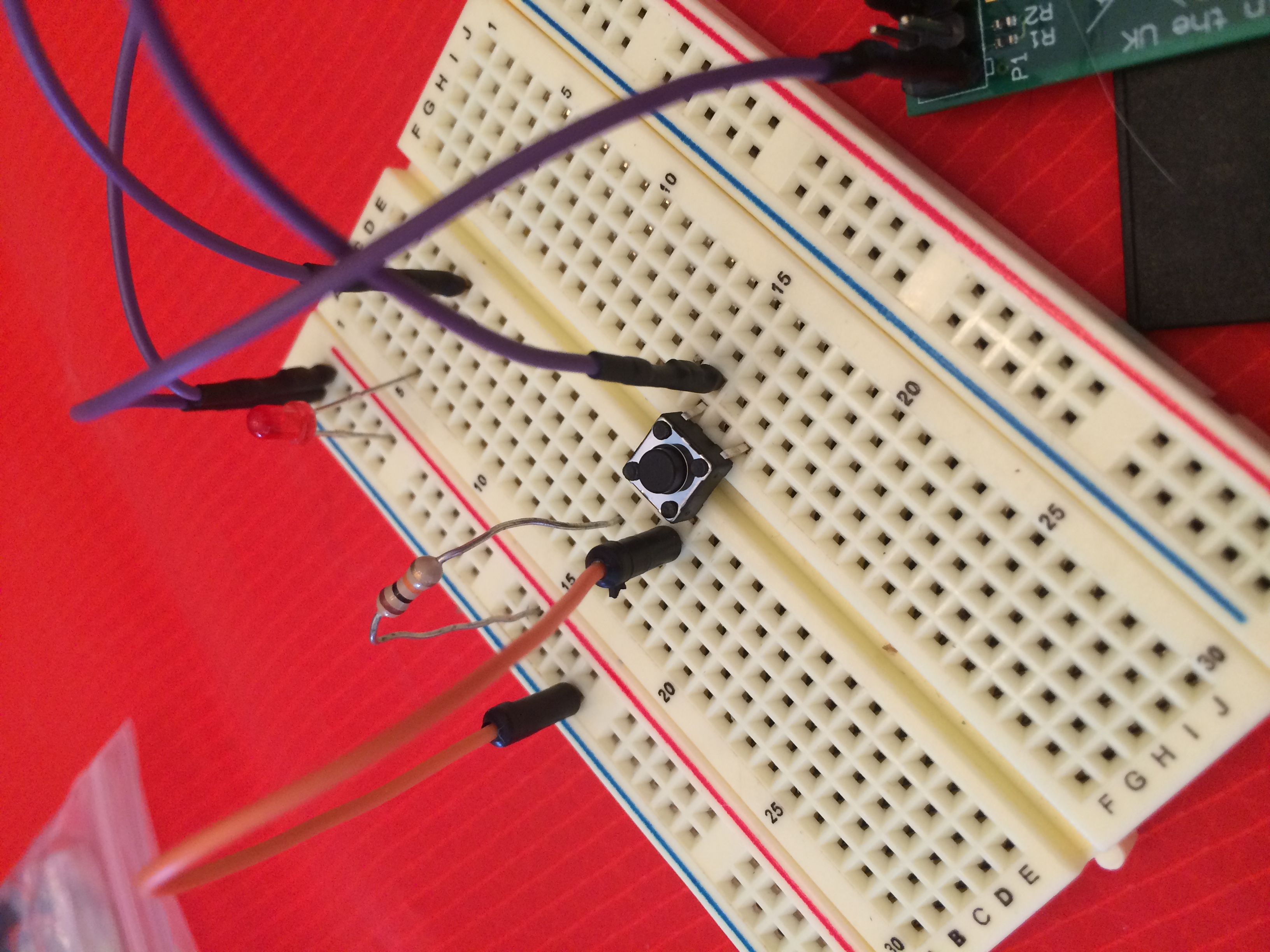 Momentary Push Button breadboarded to Pin 24 of the Raspberry Pi