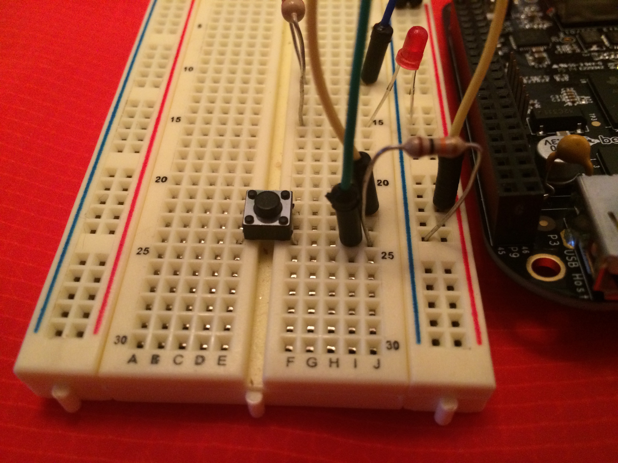 A momentary push button wired to GPIO pin 45