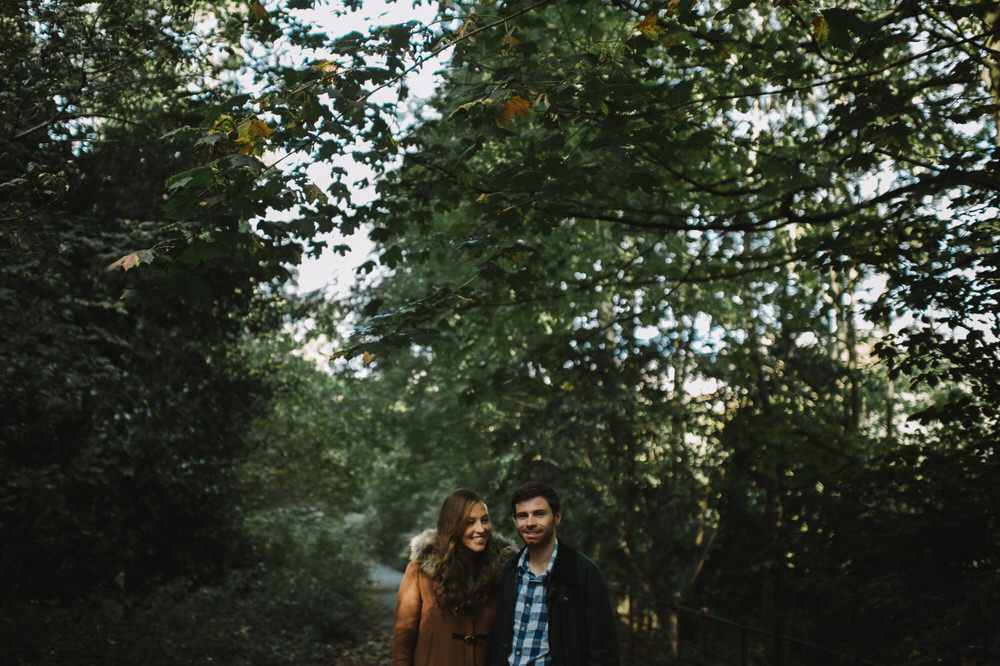 013-Portrait-Couple-Walking-Glasgow-Kelvingrove-Park-Amongst-Trees.jpg