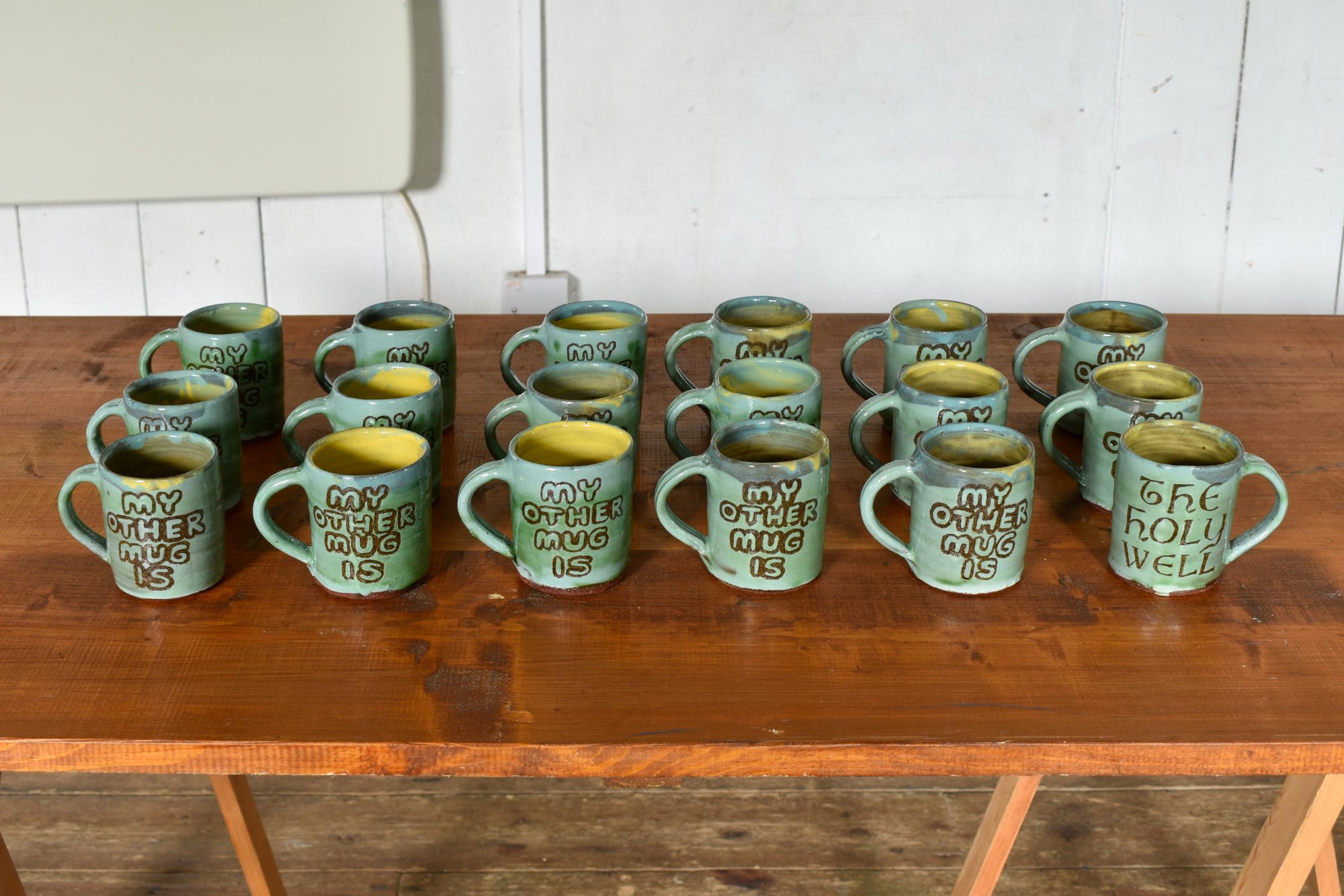   Mug (My Other Mug is the Holy Well) , 2023, single-fired terracotta, coloured slips, clear &amp; copper glaze 