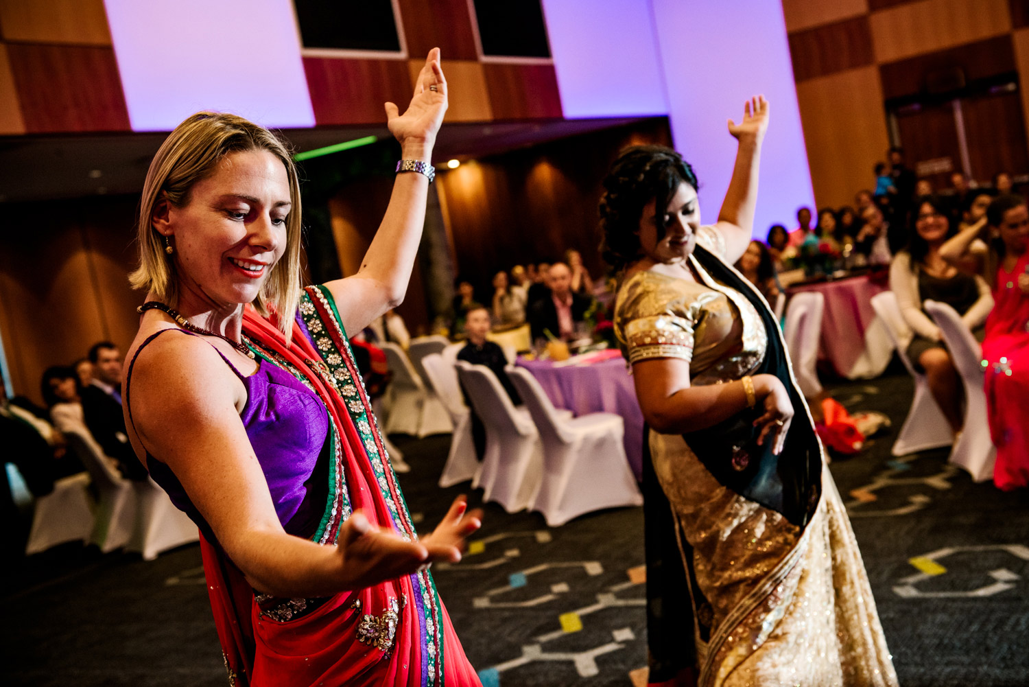 Indian dancing at traditional wedding party