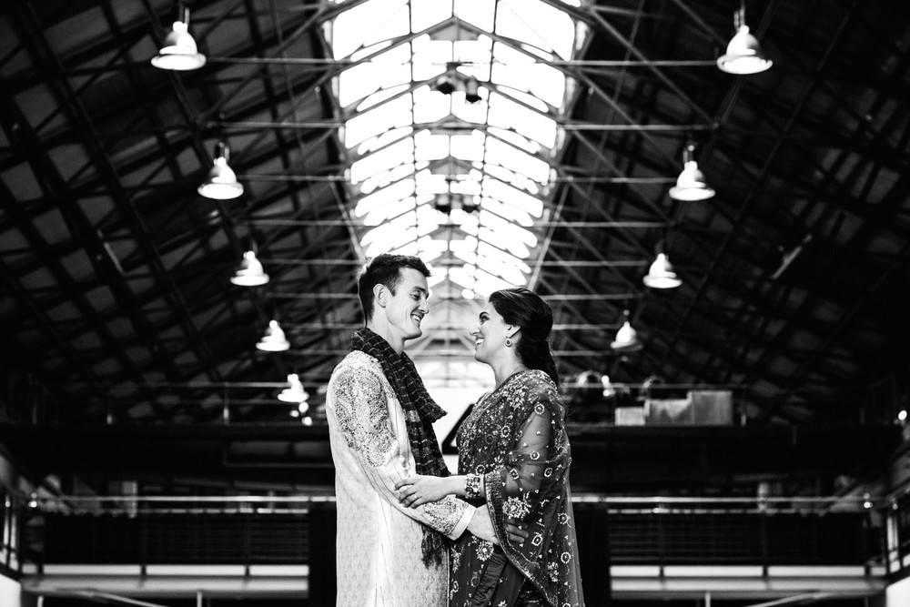 Married couple in traditional Indian wedding attire at Carriageworks