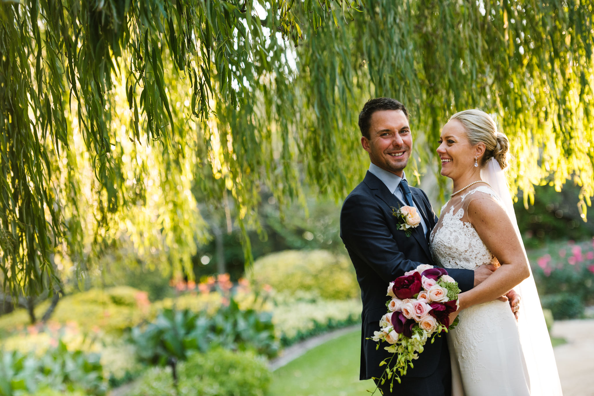 Bride and groom in gardens