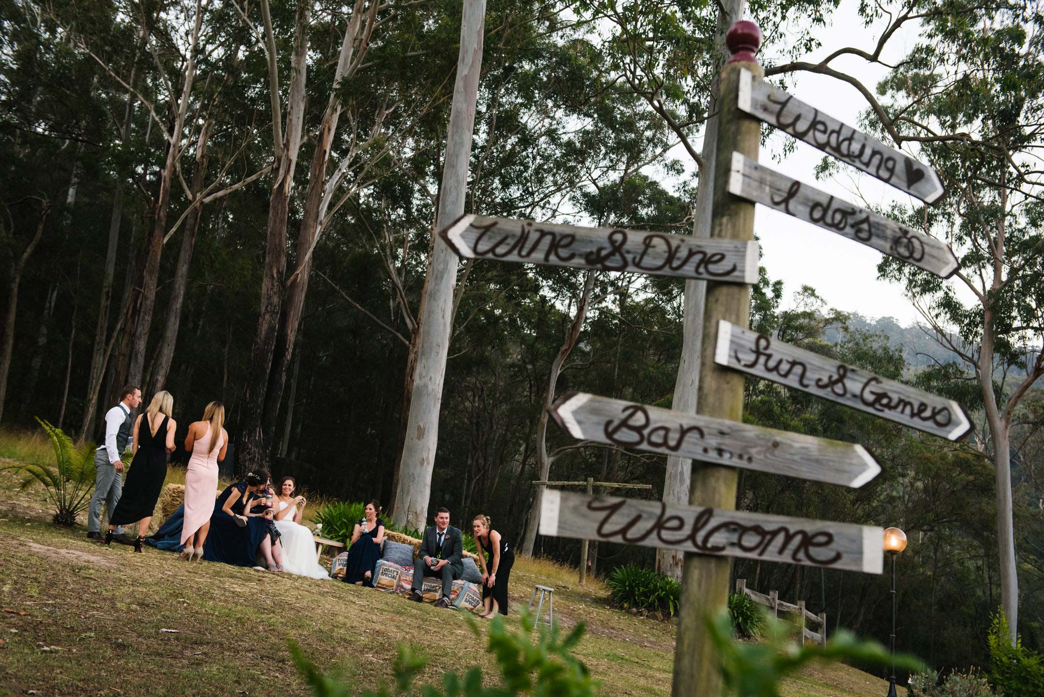 Relaxing bridal party on the grounds of Greenfield Farm Estate