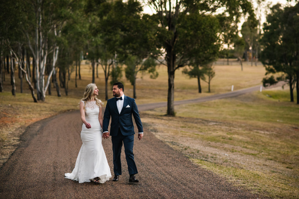 Bride and groom on country road in Hunter Valley