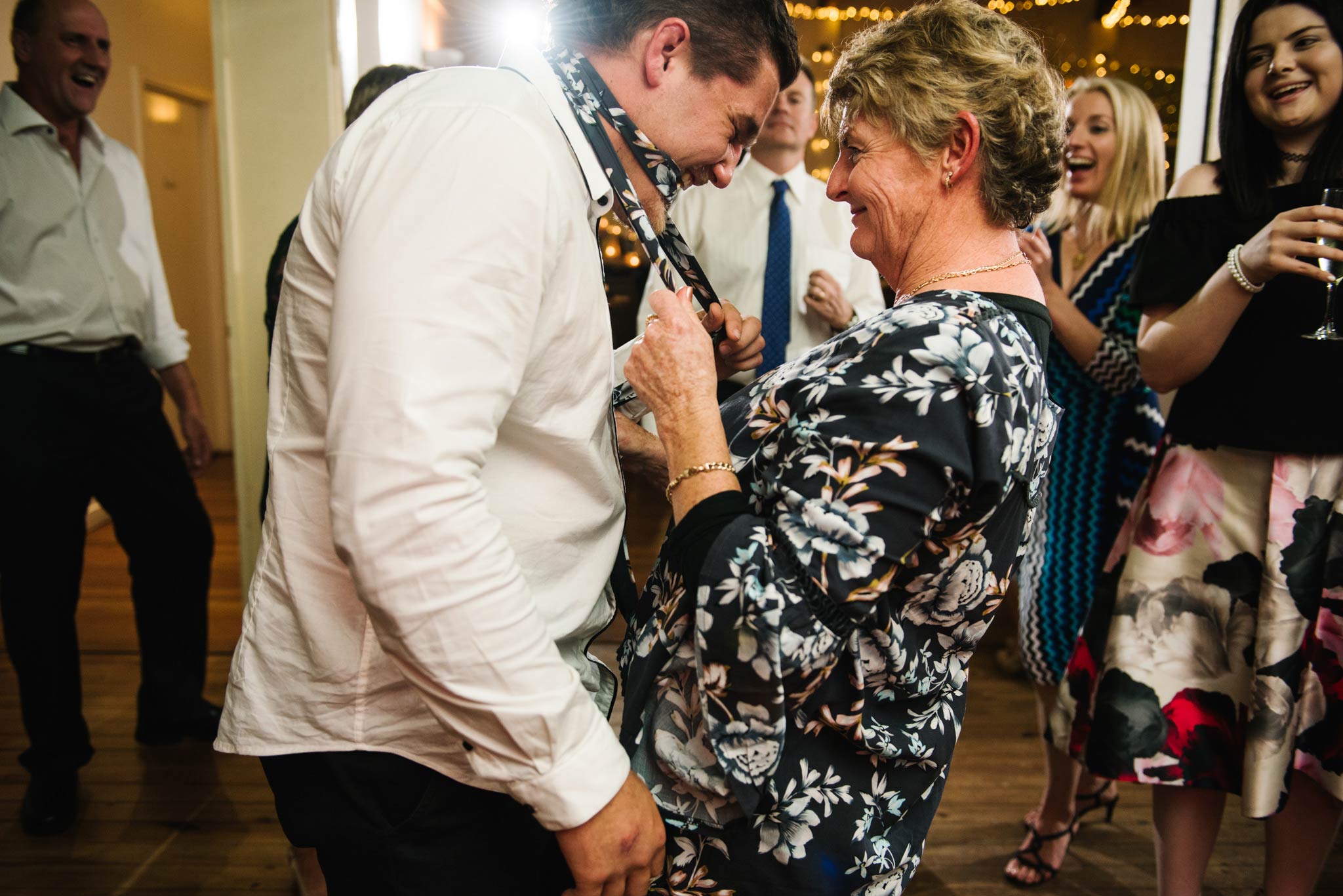 Aunt dirty dancing with guest at wedding