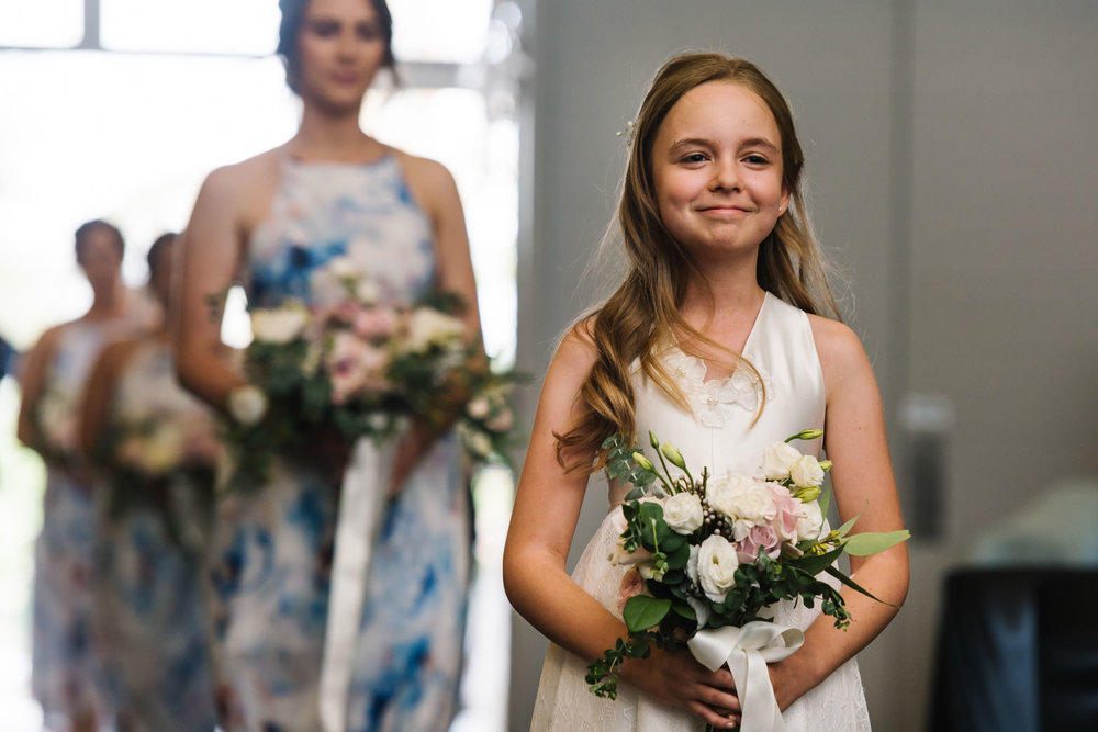 Bridesmaids walking down the aisle