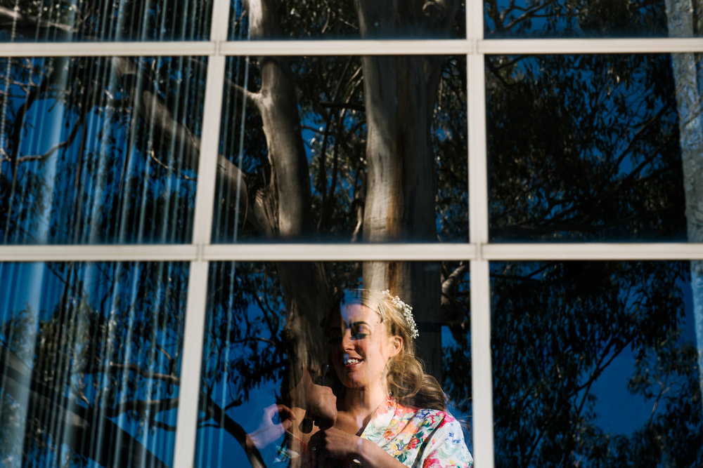 Bride gets ready at family home