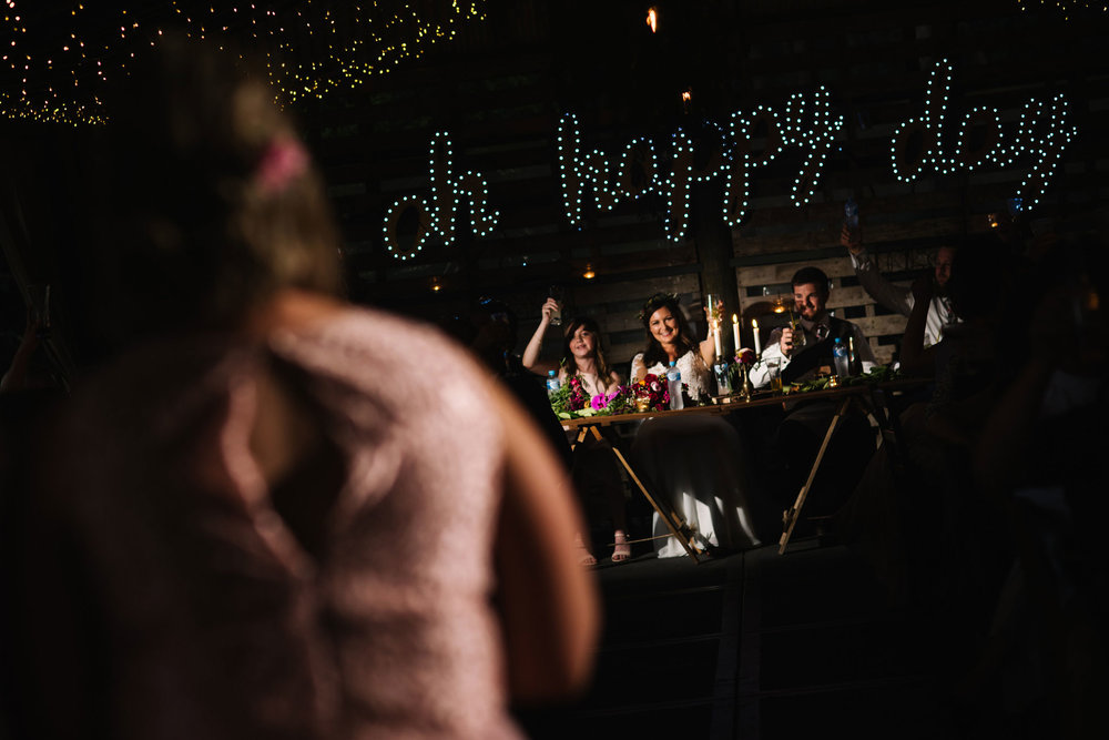 Newlyweds cheers during speeches