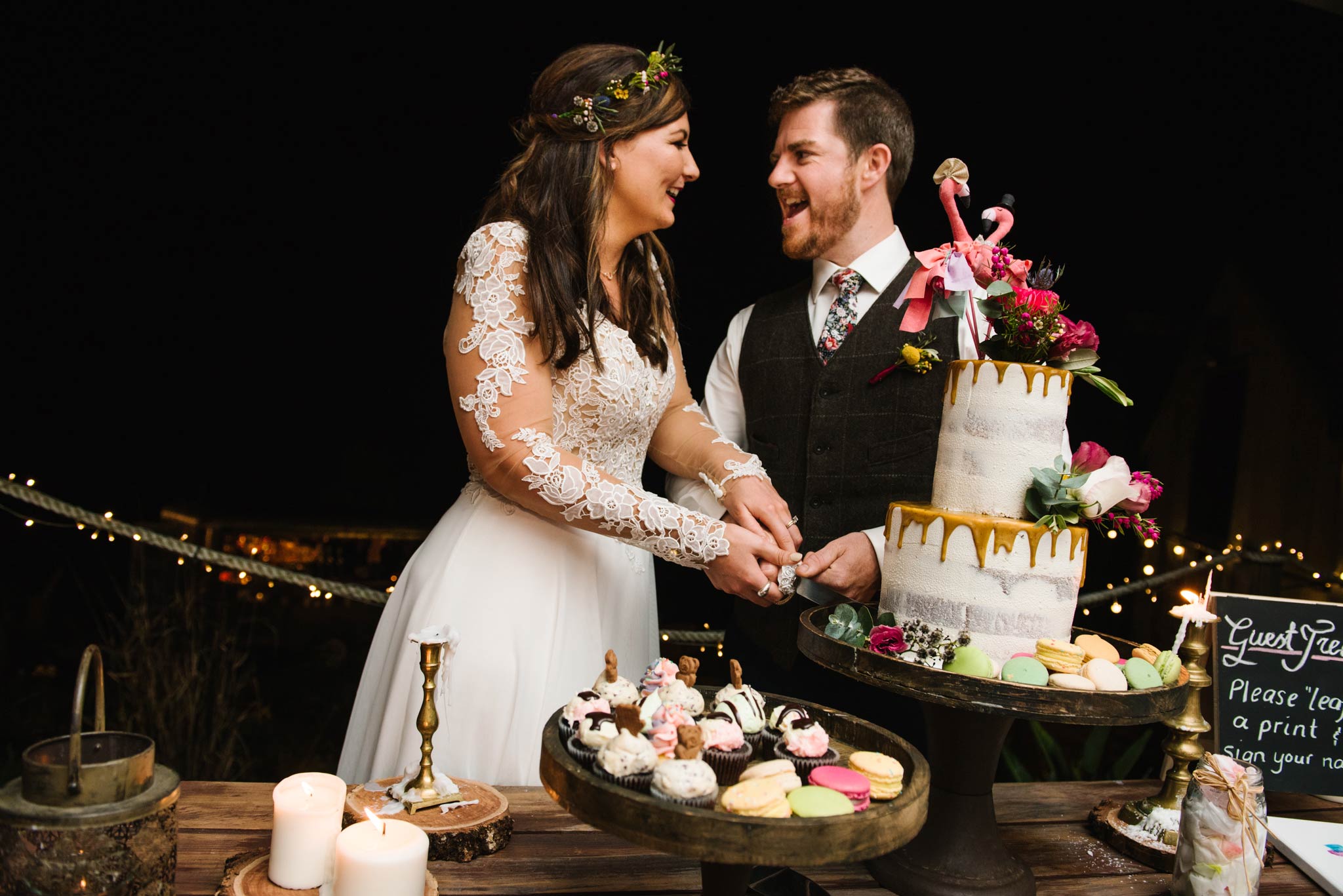 Whimsical wedding cake with flamingo topper