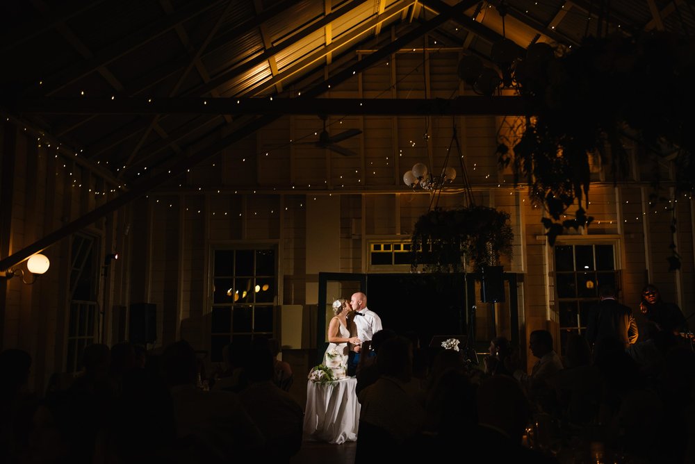 Newlyweds cut the cake at Athol Hall, Mosman wedding