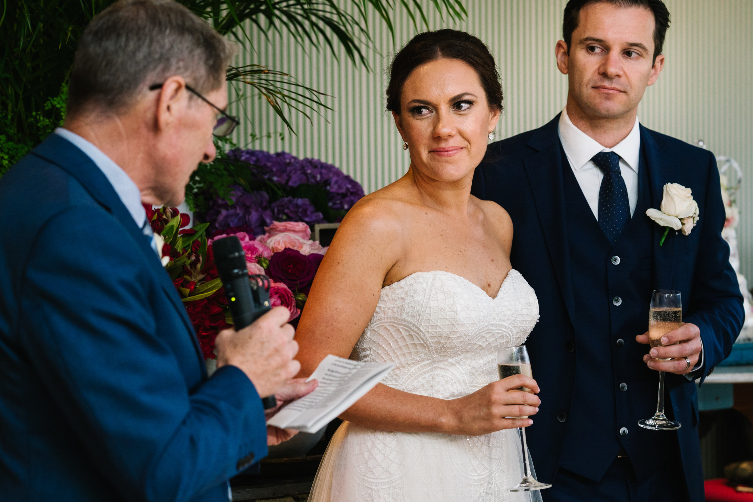 Bride looking at father during speech