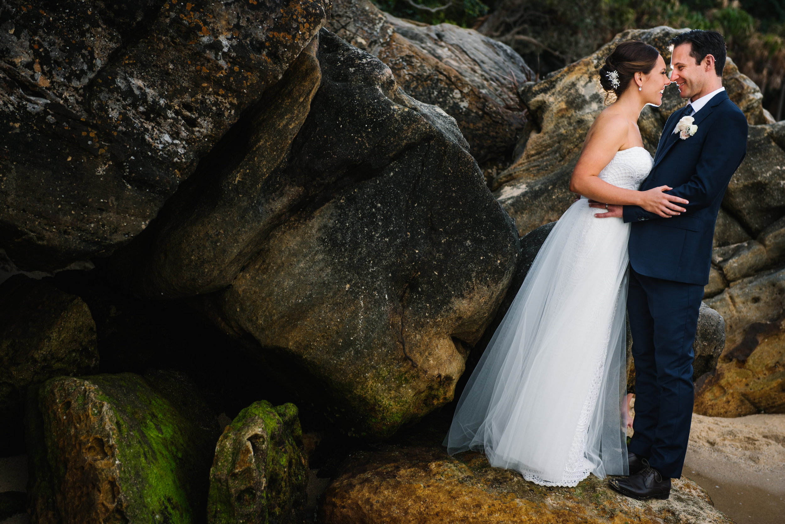 Bride and groom with rocks in the backdrop
