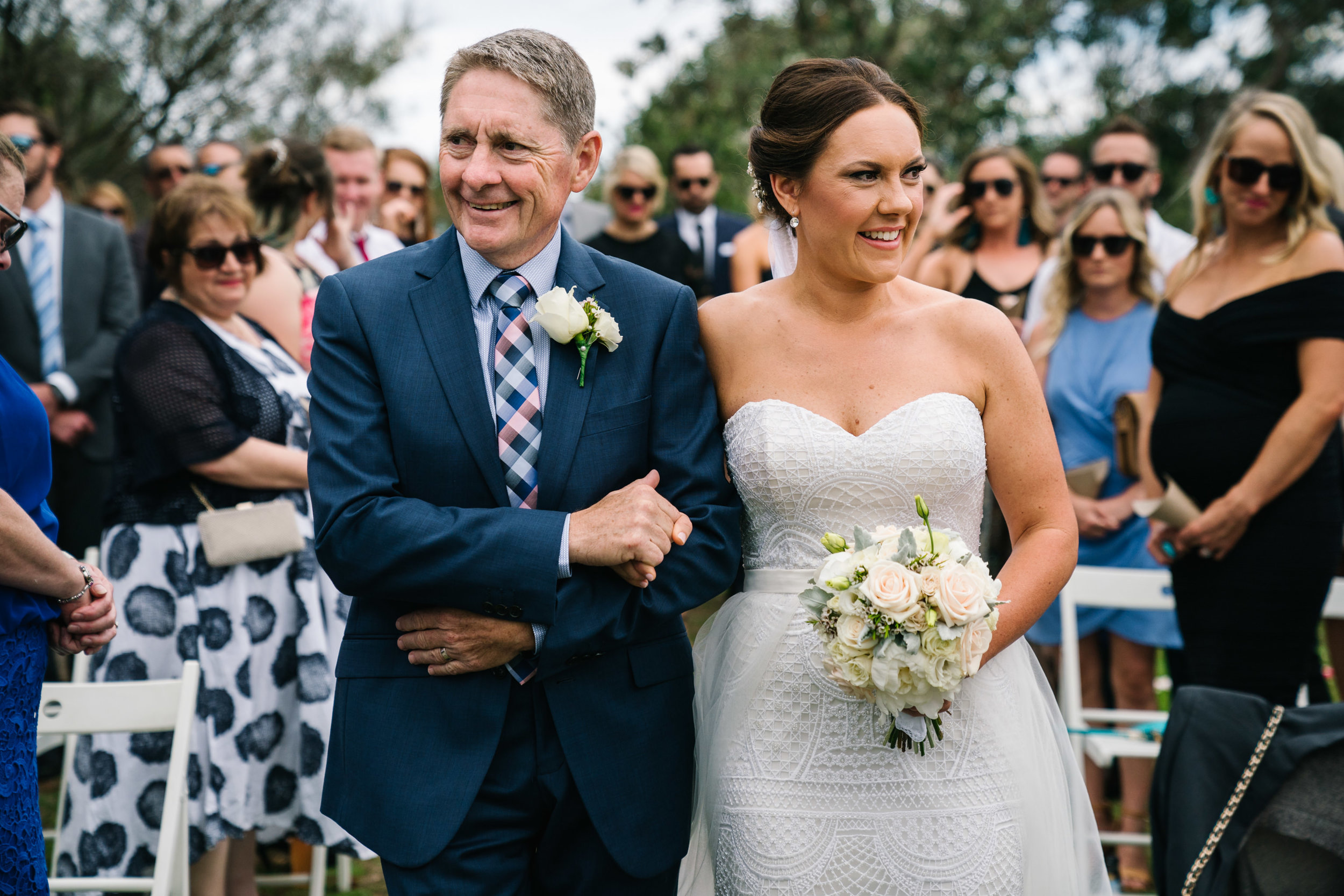 Bride and father walking down aisle