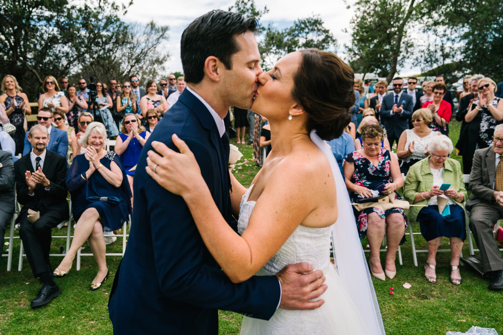 First kiss at Shelly Beach Manly wedding