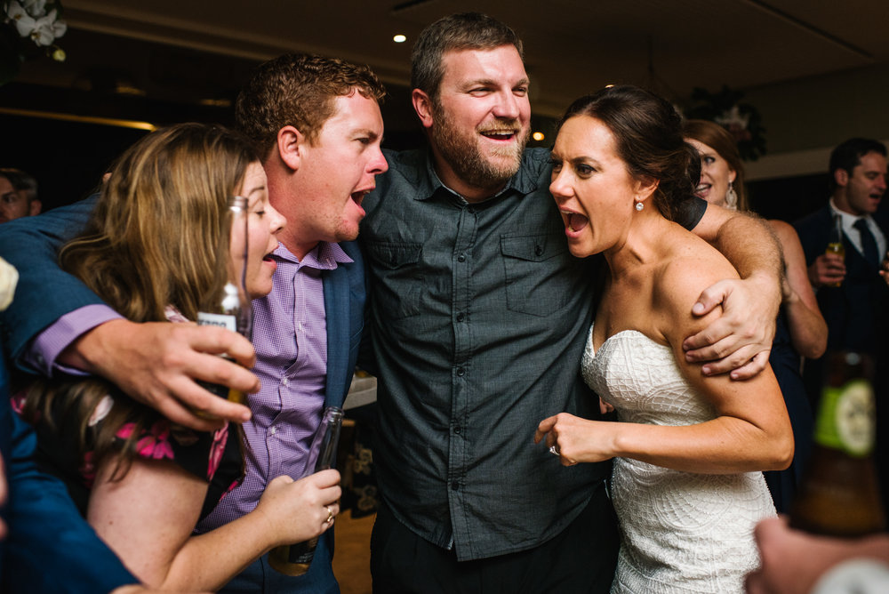 Bride singing and dancing at Boathouse Shelly Beach reception