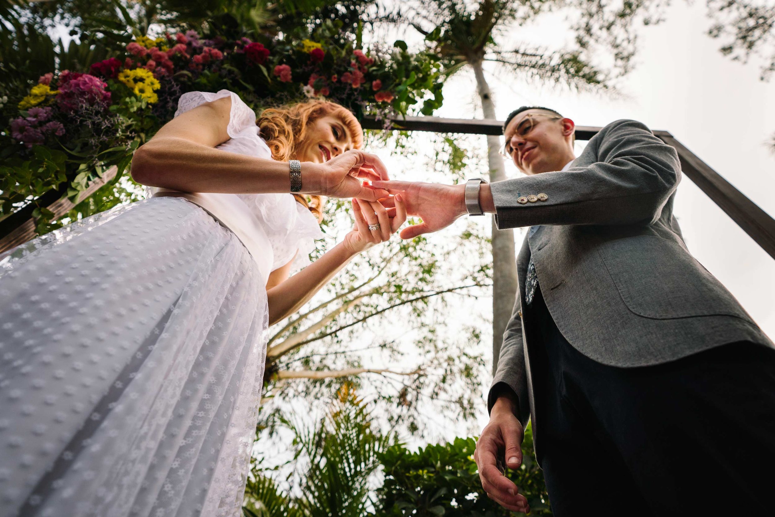 Bride and groom exchange rings at Sydney garden wedding