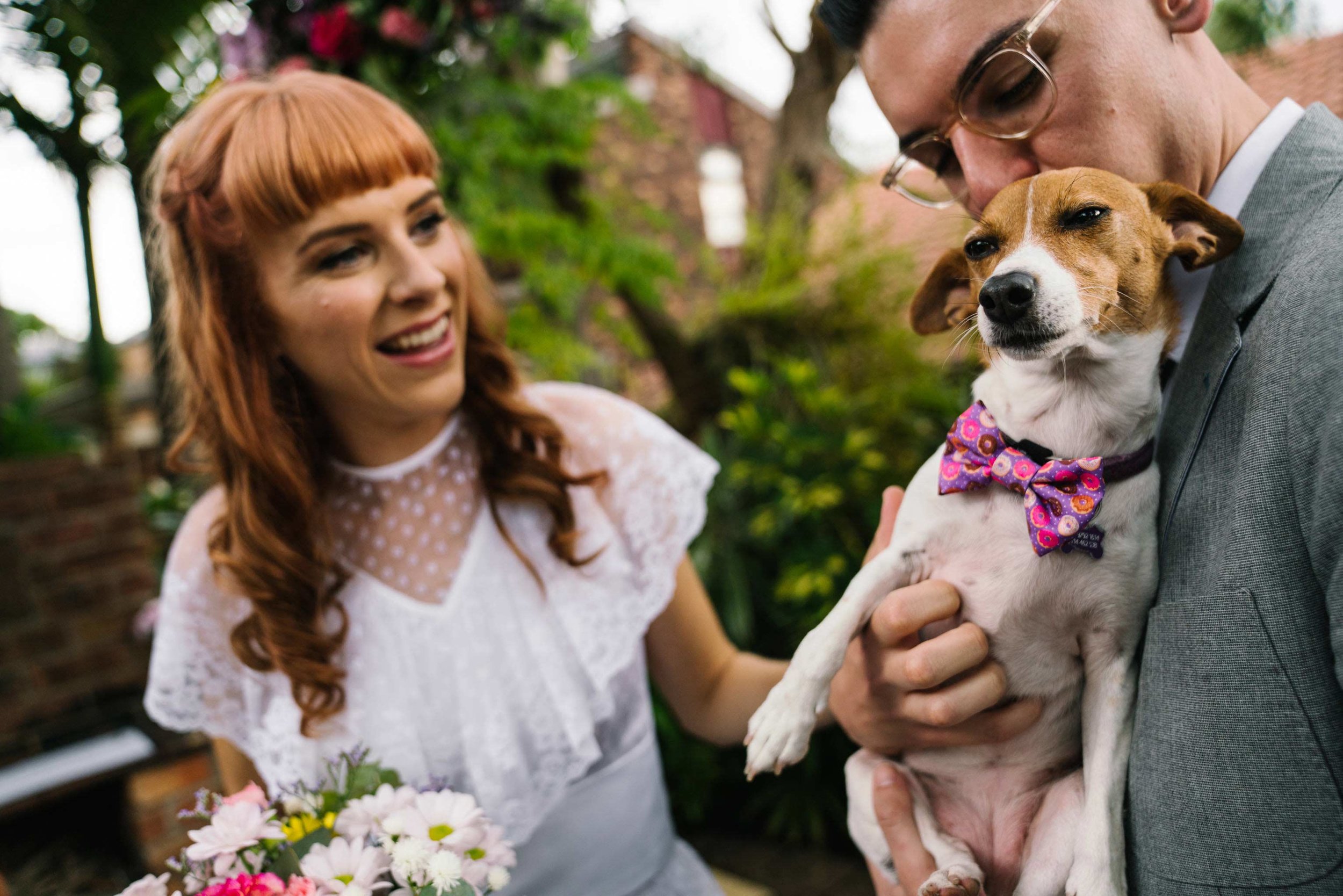 Dog as ring bearer wearing bow tie