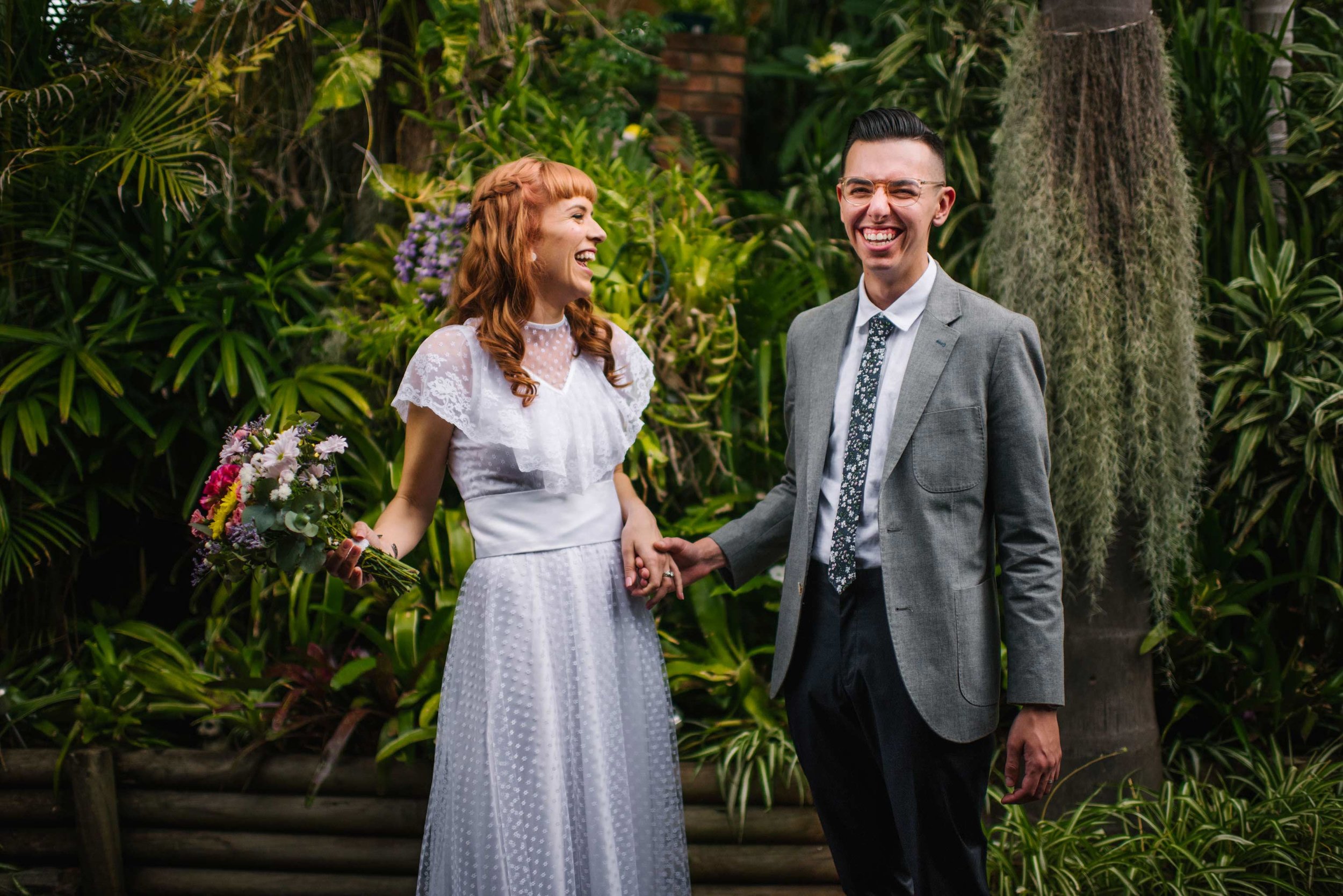 Happy newlyweds after garden ceremony