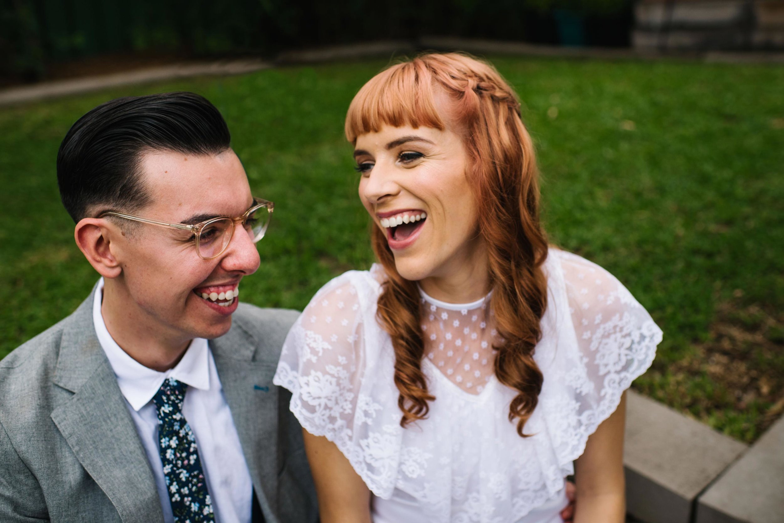 Newlyweds laughing after Sydney garden ceremony