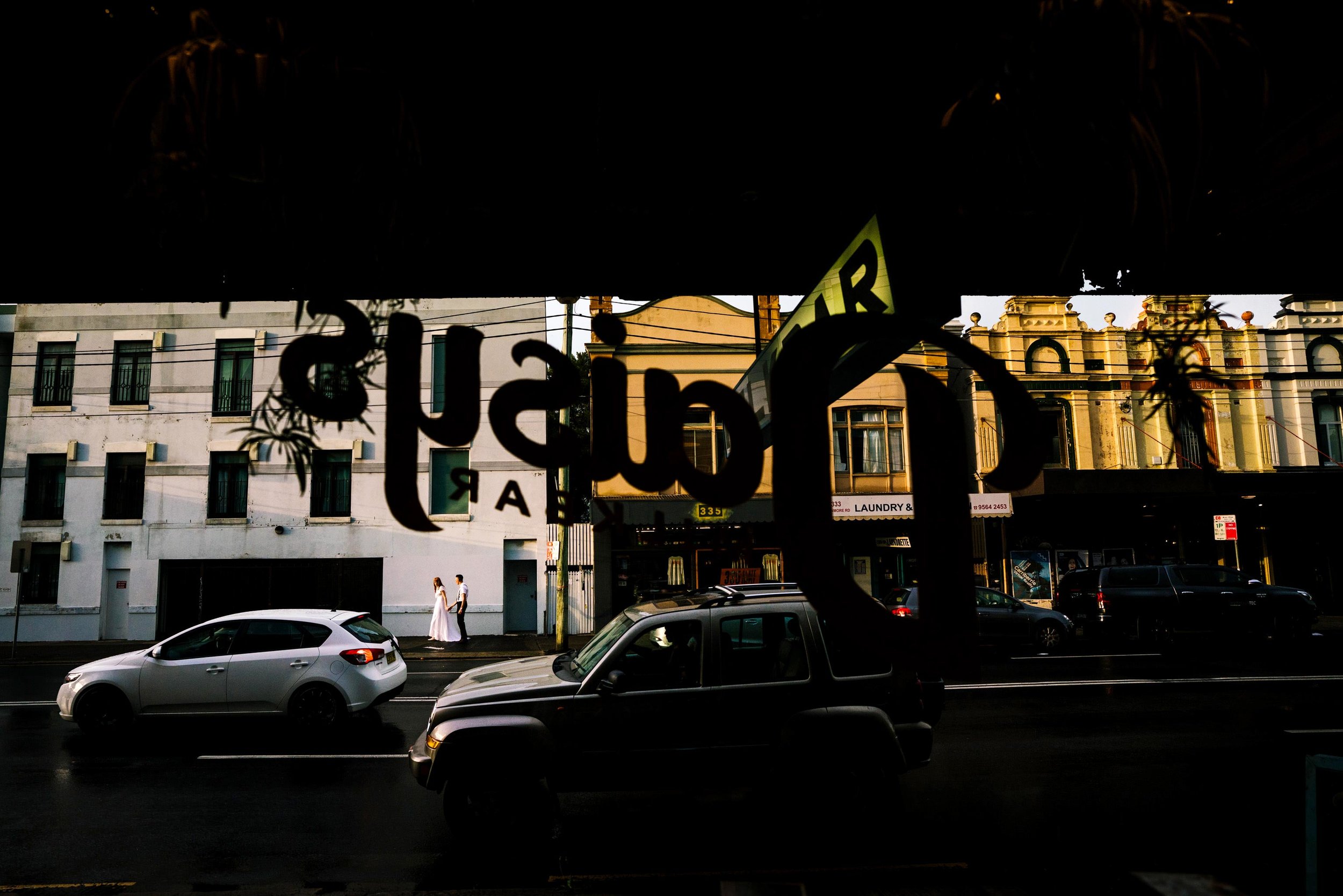 Couple walking along street in Petersham NSW