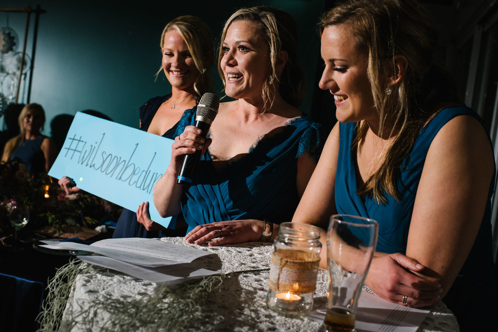 Sisters of the bride giving a funny speech