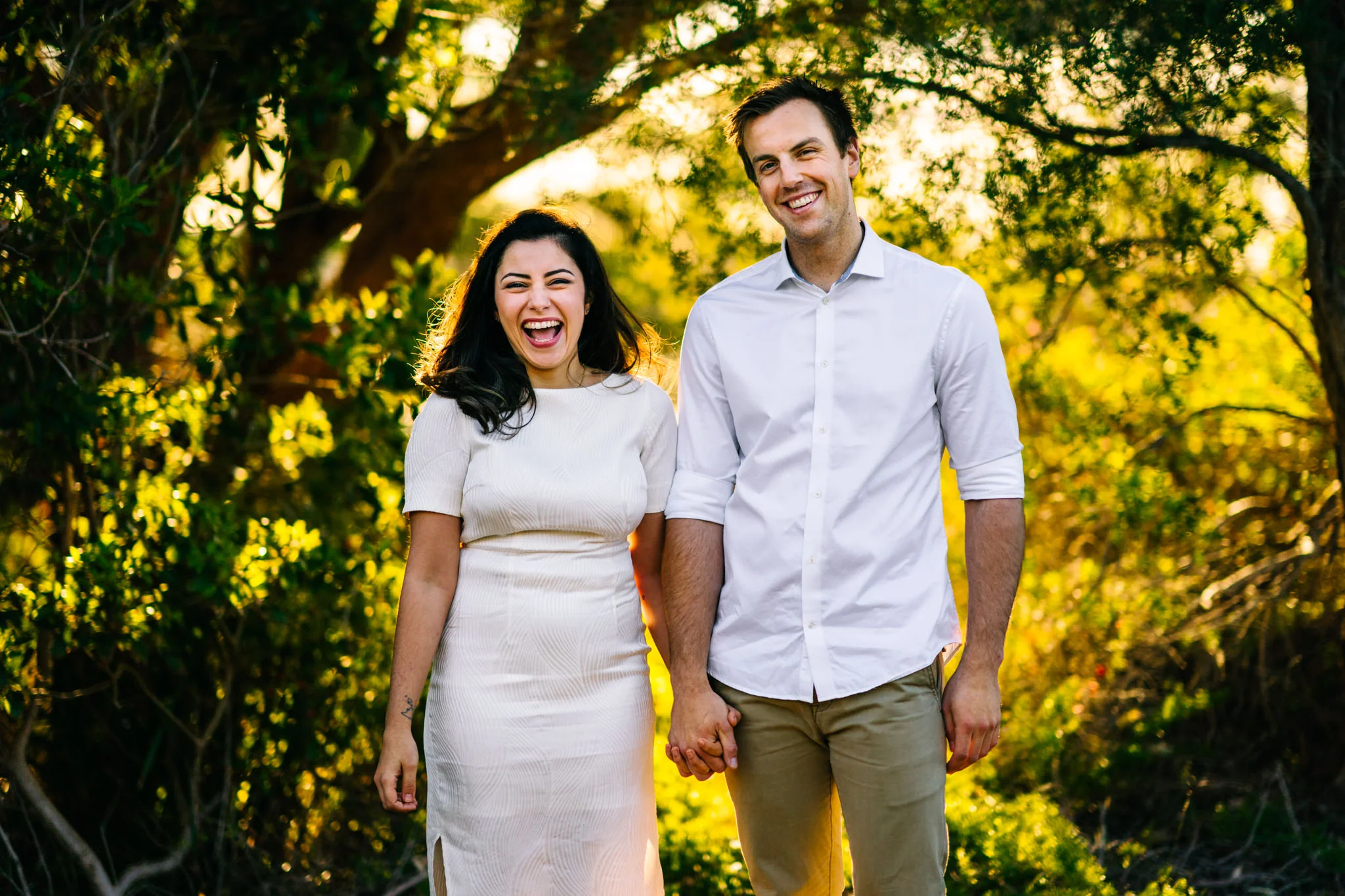 Bride to be laughs during engagement session