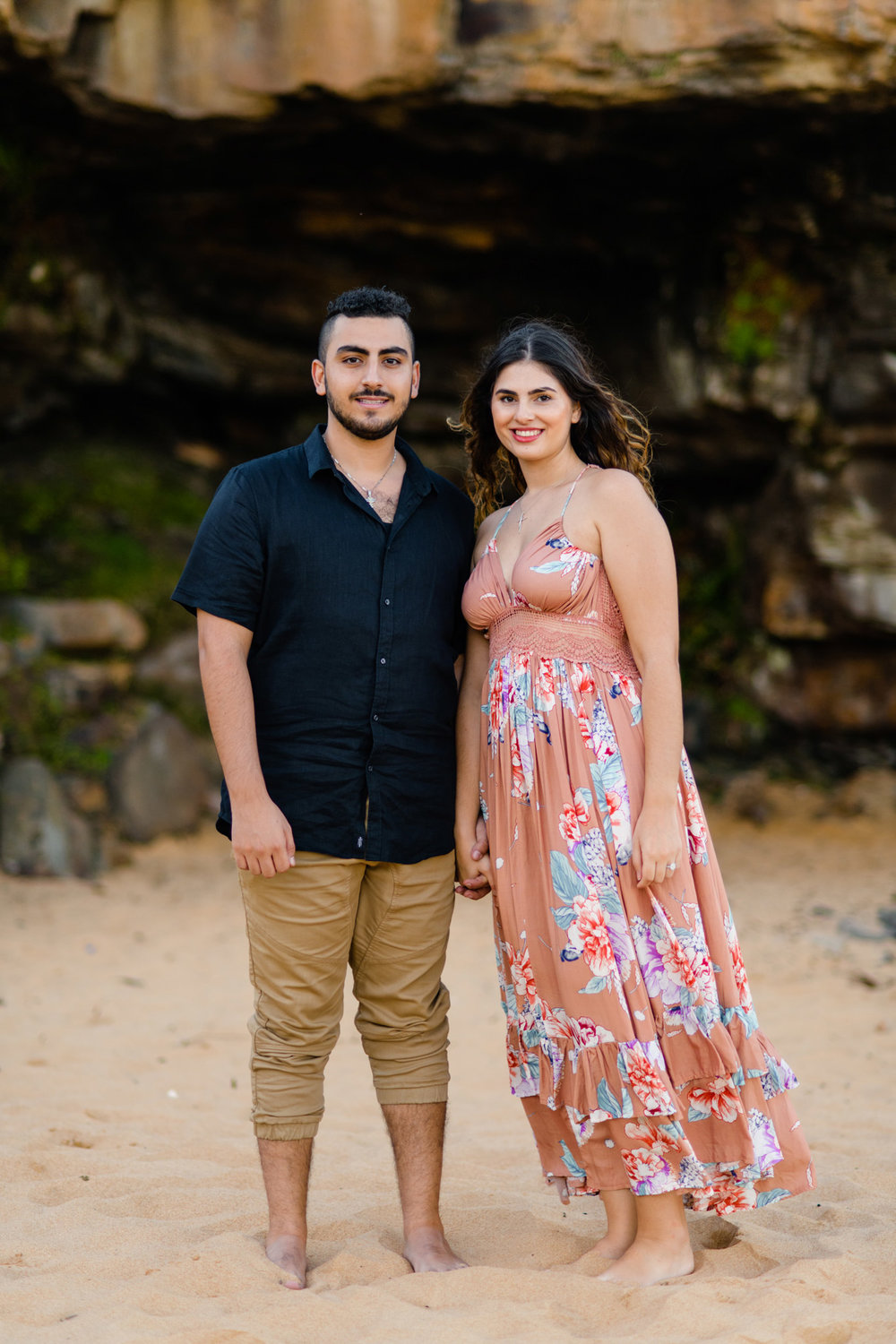 Newly engaged couple on Turimetta Beach