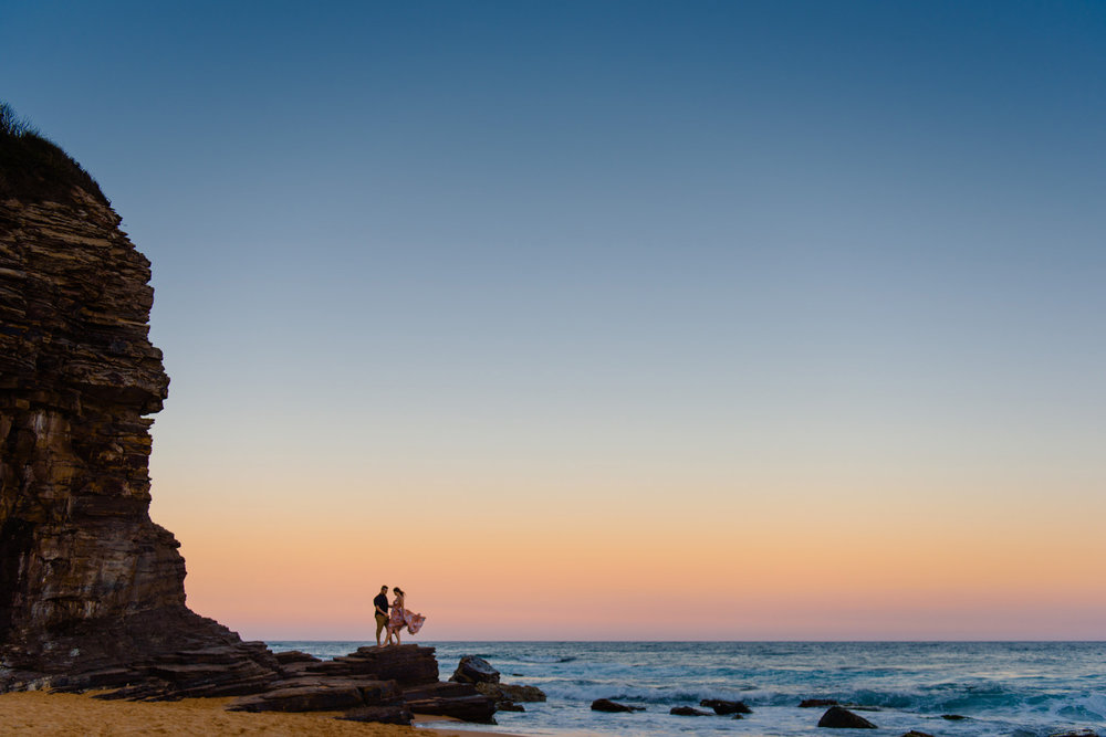 Beautiful sunset during engagement photos at Turimetta beach