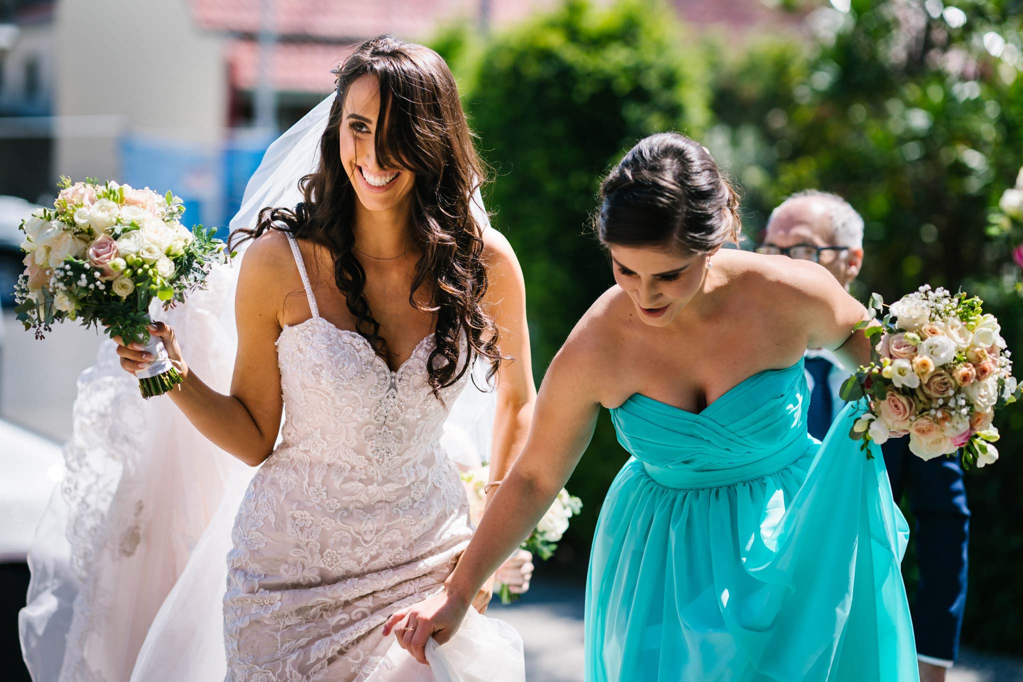 Bride arriving at the Greek Orthodox church for wedding ceremony