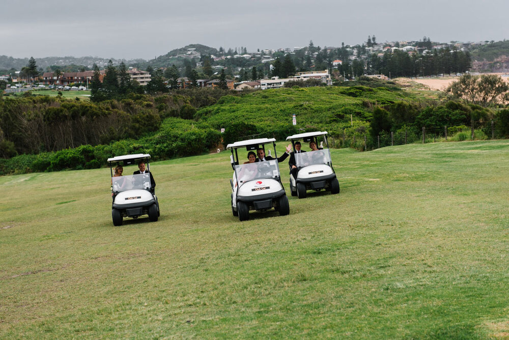 Wedding party on golf buggies at Monash Country club