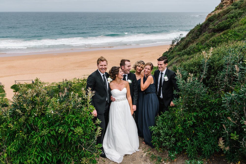 Bridal party posing at Narrabeen beach