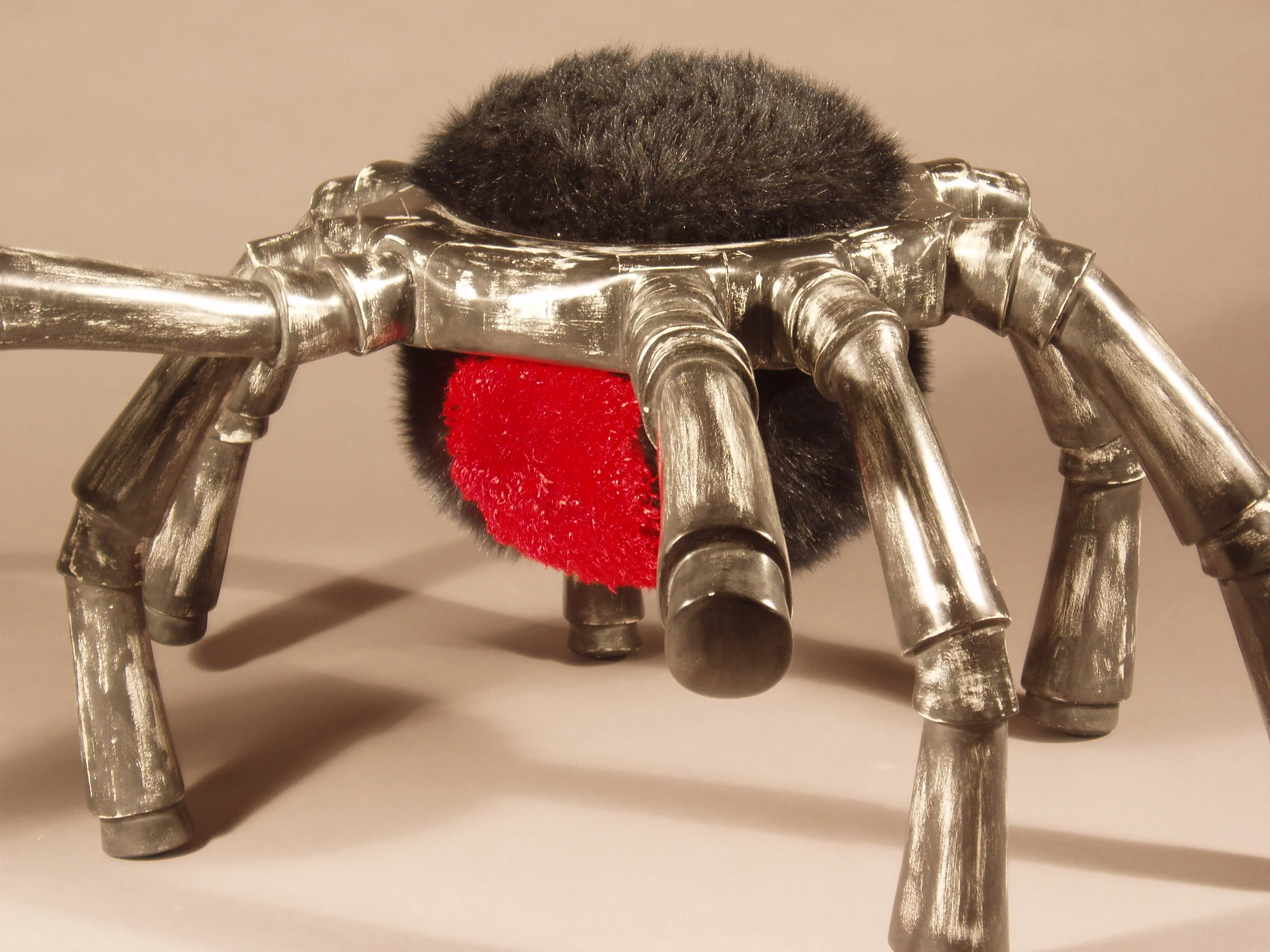 Black Widow Ottoman.jpg