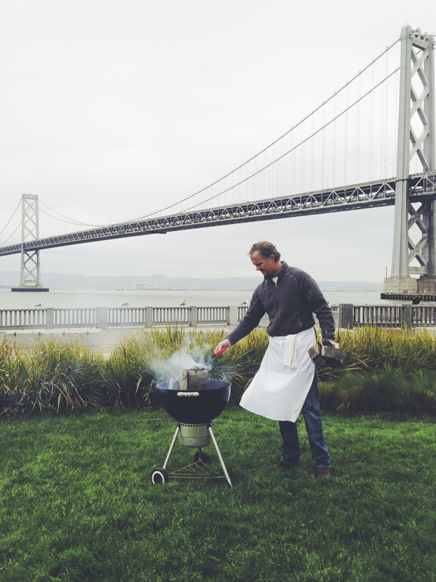 Chef Parke and his grill under the Bay Bridge.