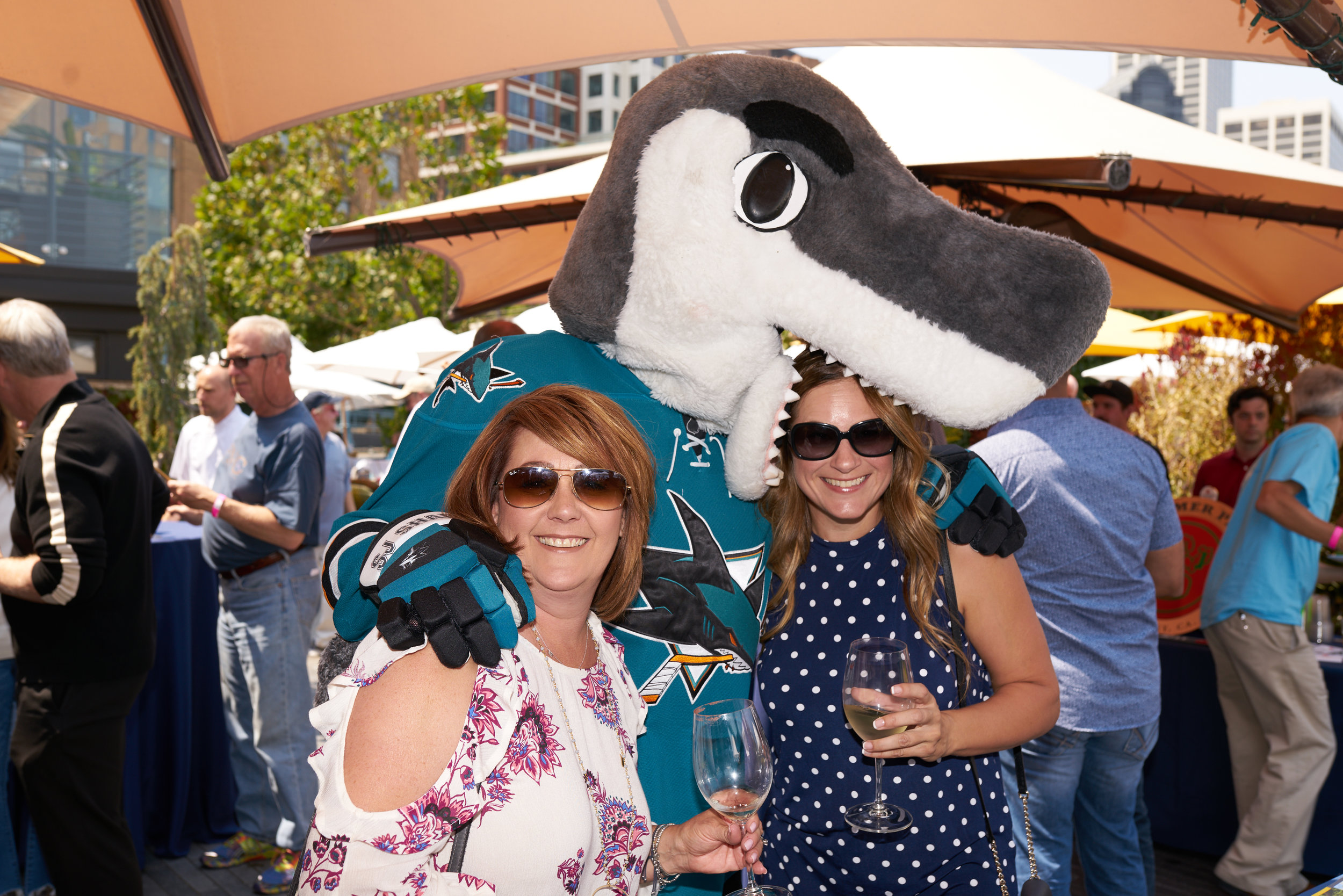 photo of oysterfest - shark mascot with people