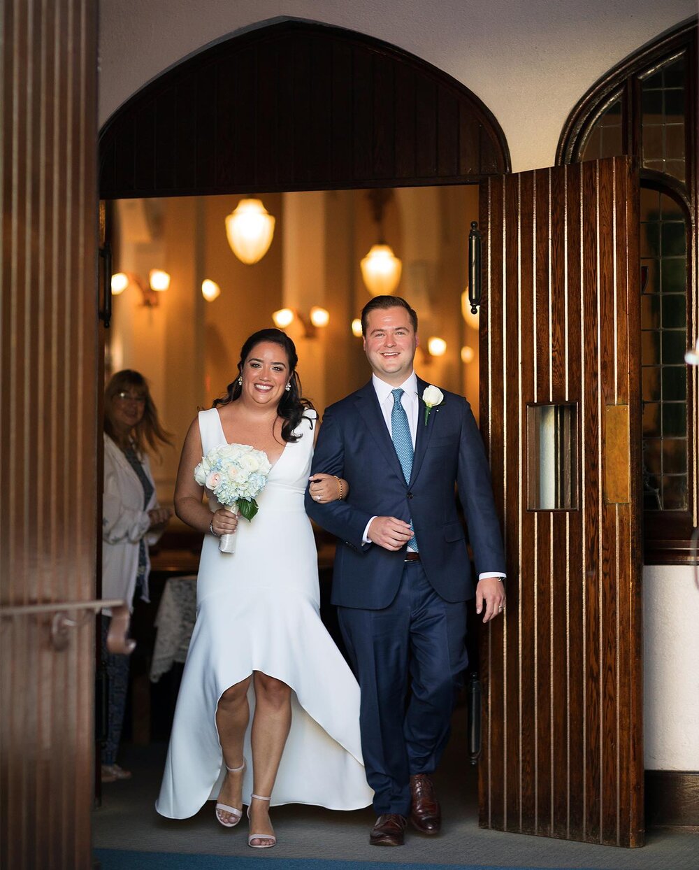 Ali and Andrew wed this September at beautiful little church with their close family in Manchester by the Sea. It was live streamed so their friends could be there via Zoom. The priest even had everyone in the pews turn around and wave to the virtual