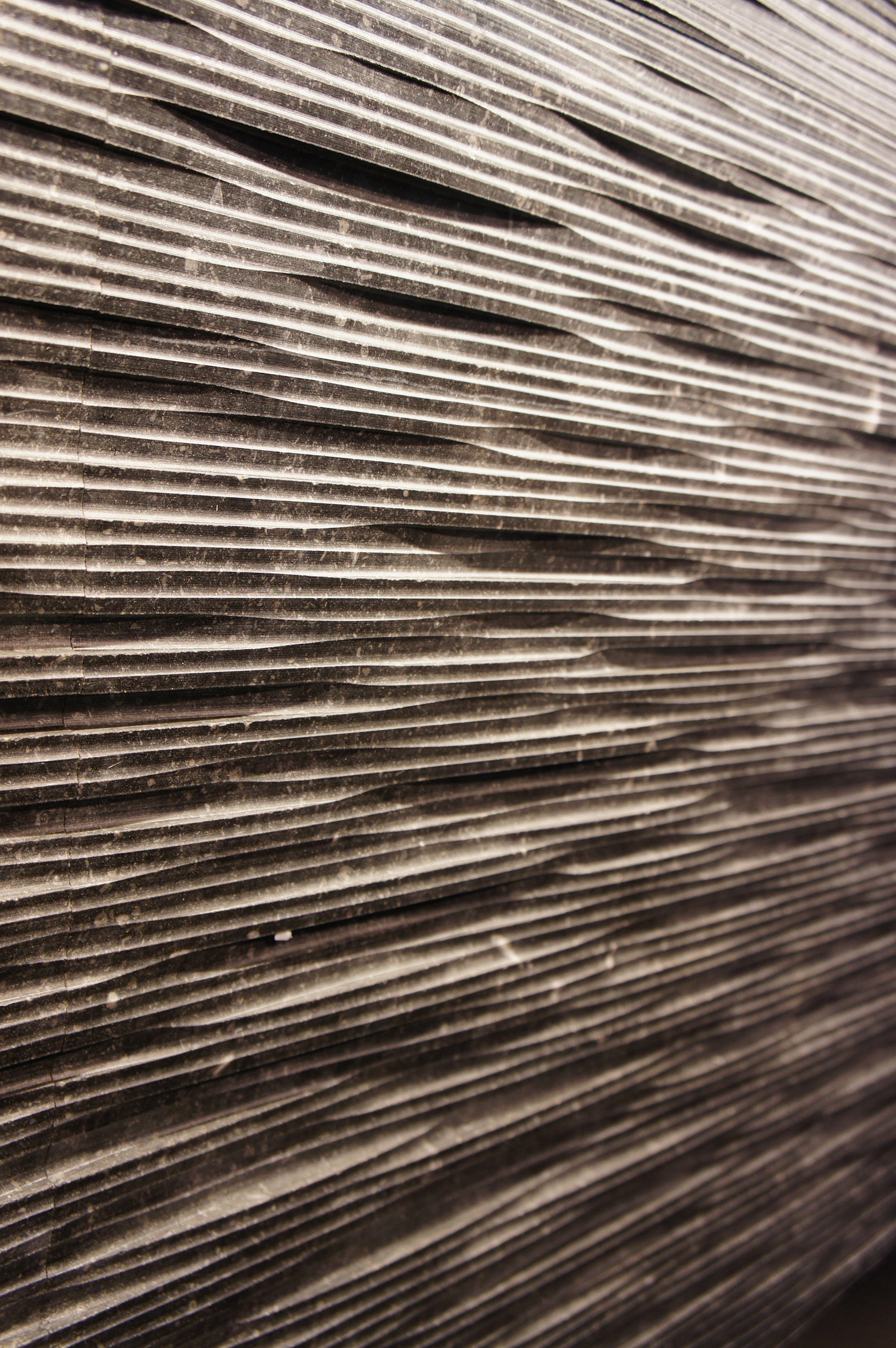 Basket-weave type pattern. Notice the light and dark contrast from the grooves. Hedonism collection by Petra Antiqua