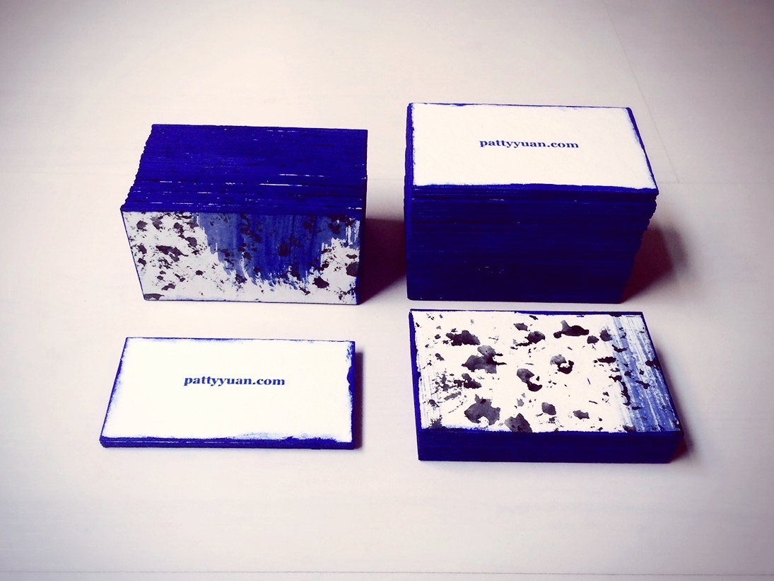 Url is screen printed. Cobalt blue acrylic paint is sponged on the borders.