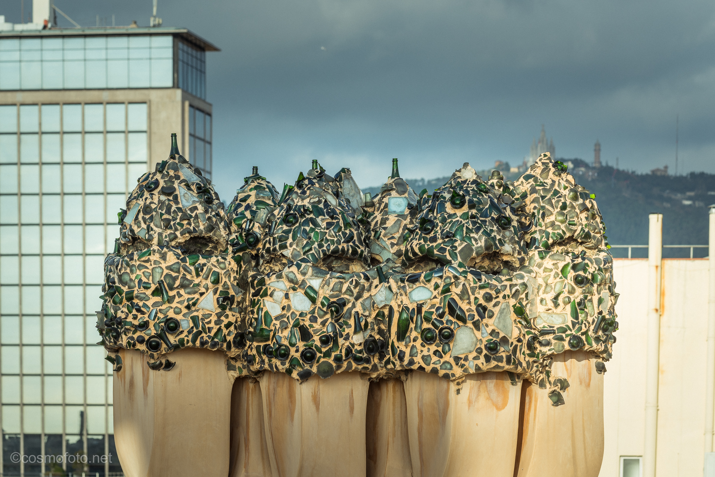 Gaudi used broken champagne bottles to make make chimneys look better. Not a bad idea, and I'm sure emptying the bottles was just as much fun:) 