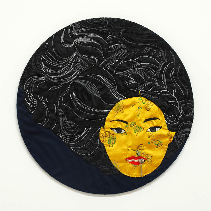   Asian Girl  threads, zipper, satin fabric and Chinese silk on panel 15" (38cm) diameter, 2009 