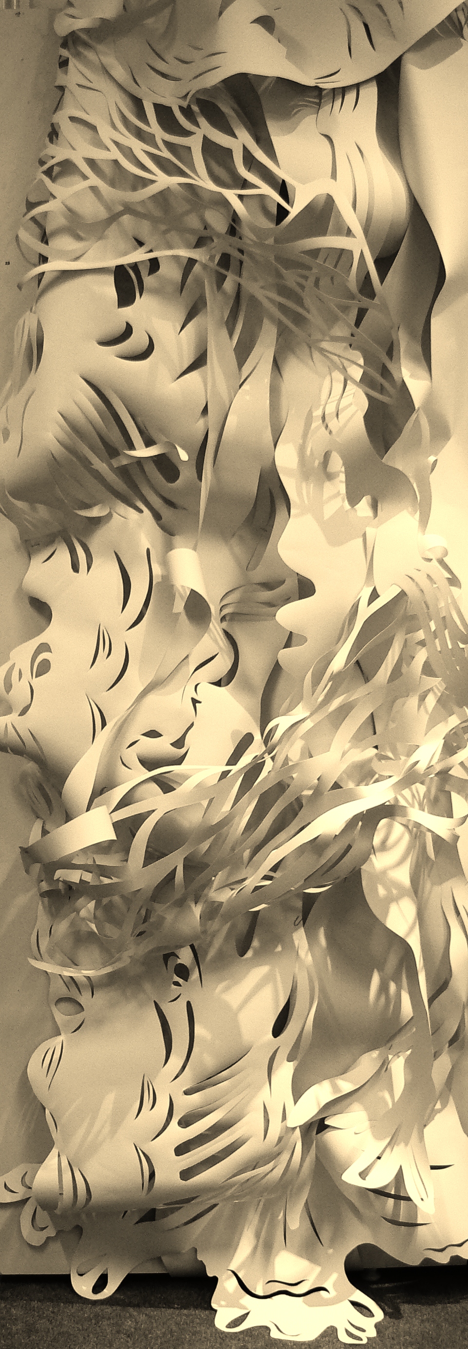 Cut paper - 'Meditation on the Waves' at Thame Museum.