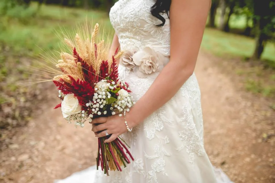 Samantha Daniels Photography . I'm still obsessing over Jordan + Nick 's gorgeous cranberry and wheat wedding. We love a unique color palette and theme, and it just doesn't get much better than this pretty rustic-chic fall wedding.