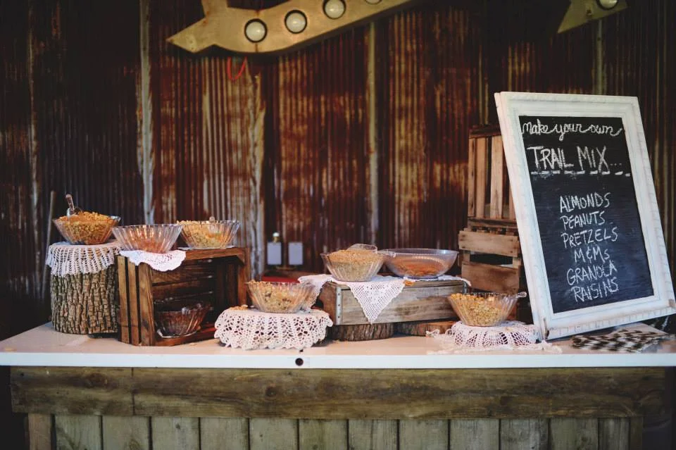 Stephanie Parsley Photography . Samantha + Danny 's trail mix bar was creative, and it made for the perfect favor!