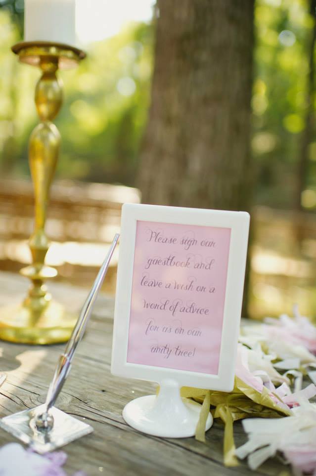 Melissa McCrotty Photography . At mine + Richard 's wedding, we asked our guests to leave a word of advice or a wish for us on a little tag and then hang it on our unity tree, which we watered during our ceremony!