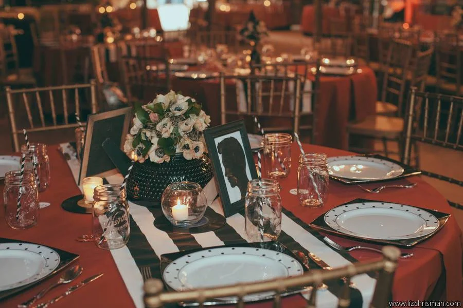 Liz Chrisman Photography , from Katie + Joe 's wedding at The Barn. Striped table runners + polka dotted plates! The perfect additions to this rock & roll-meets-pin-up wedding.
