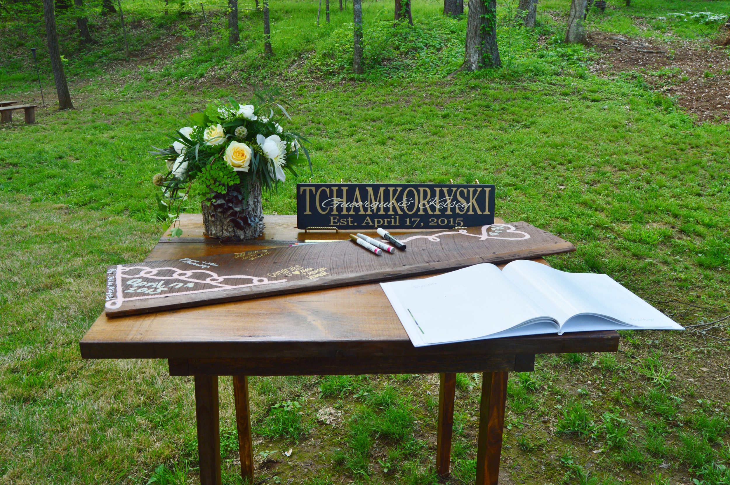 Their guestbook was an old piece of wood that Kelsey's cousin painted.