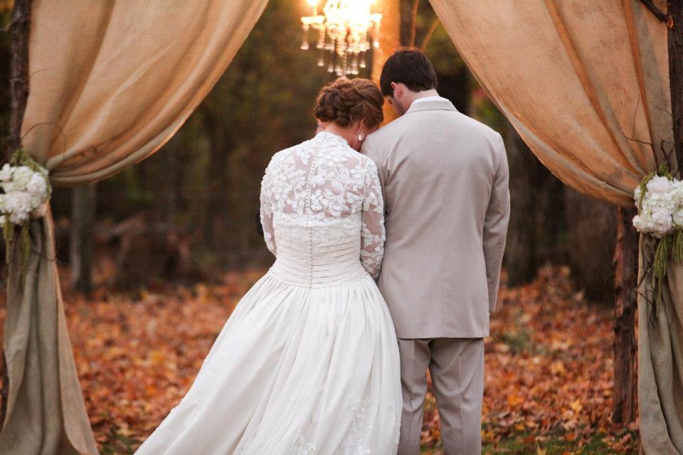 JRowe Photography , from Jana + Robert 's wedding at The Barn. This wedding had a classic black and ivory color scheme that would have been pretty for any season, but the addition of burlap and that dress (SWOON!!!) made it super perfect for fall. 