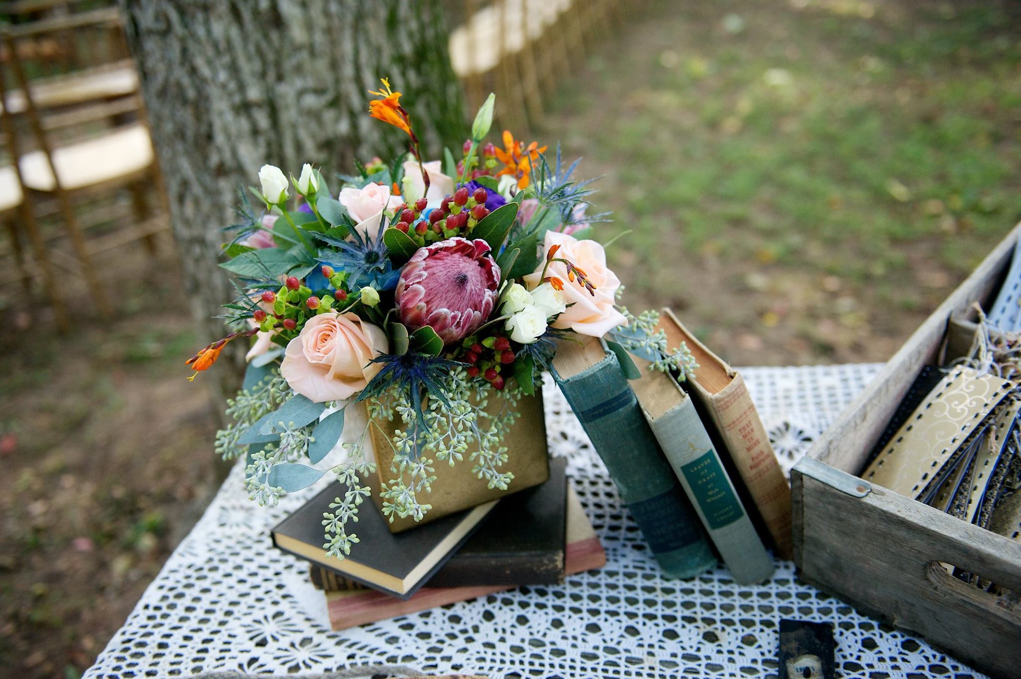Danielle Davis Art/Photography , from Emily + Blake 's wedding at The Barn. Protea always makes a statement! 