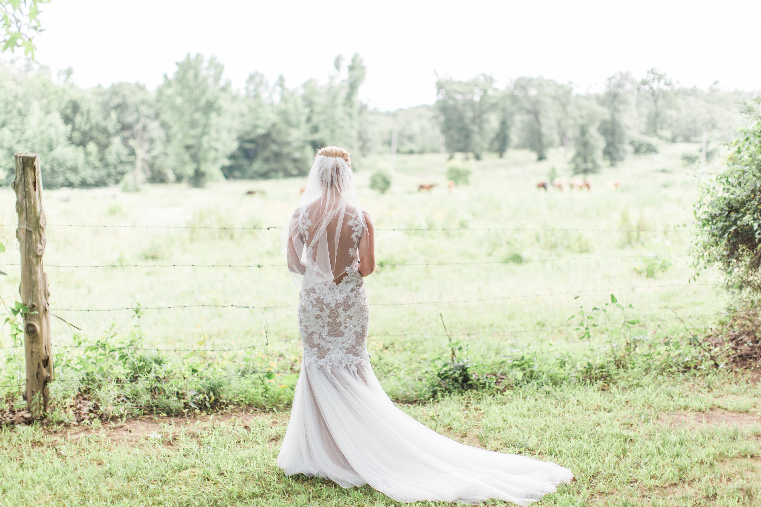 Lela & Lyla , from Kassie + Adam 's wedding. When you're wearing the most gorgeous gown on the planet, a simple, classic veil is all you need. 