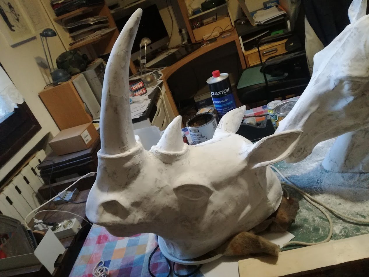 Teste rinoceronte animale cartapesta artistica finish finitura bronzo rame marmo gesso oro avorio arancione fosforescente